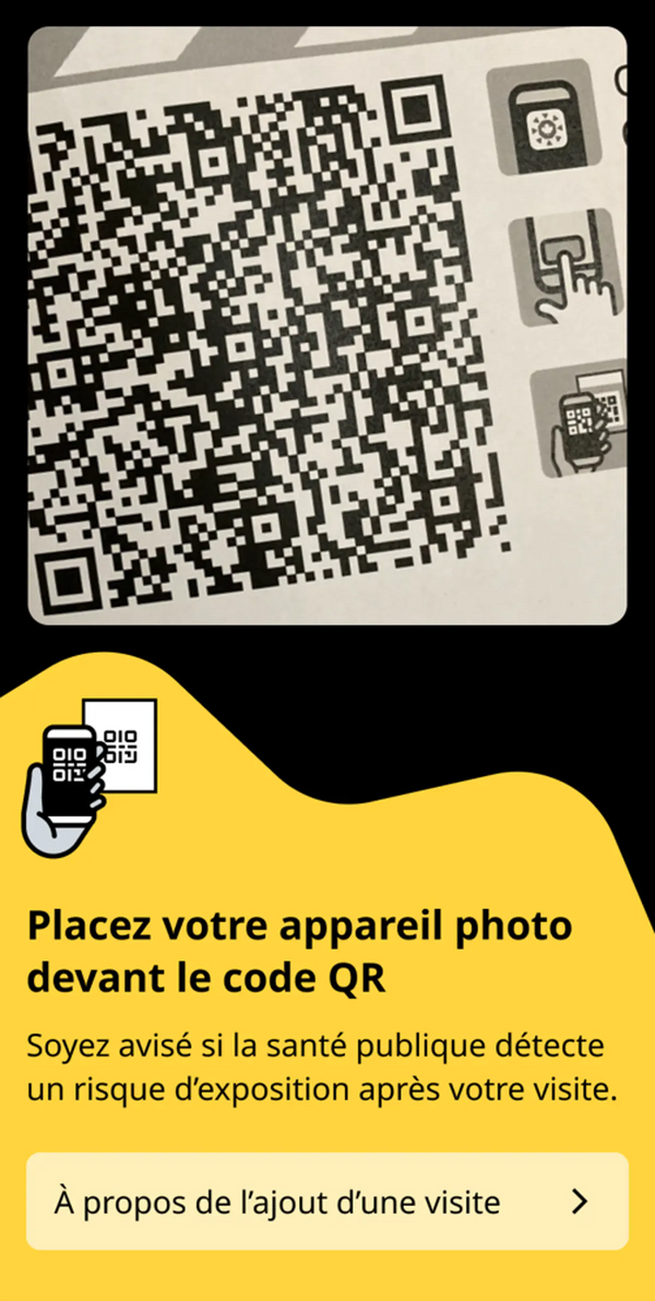 Interface d'application mobile permettant de numériser un code QR à l'aide de la caméra.