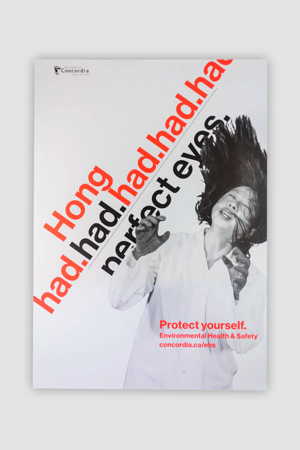 Hong is surprised by something and has her eyes closed for protection. Poster slogan run diagonaly towards Hong. 